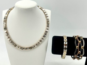 lot 29 image: Gold and Silver Tone Necklace with 2 Statement Bracelets