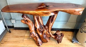 lot 1 image: Live Edge Carved Wood Console Table with Natural Root Base