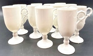 lot 38 image: Set of 11 White Pedestal Porcelain Irish Coffee Mugs