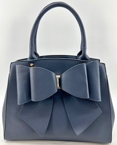 lot 43 image: Grossi Navy Blue Handbag with Large Bow Accent and Removable Strap