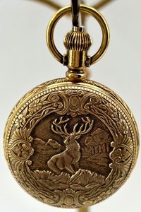 lot 59 image: Henkel Swiss Shock Resistant Gold Tone Pocket Watch with Stag and Floral Engraving