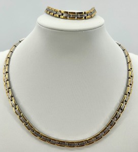 lot 61 image: Two-Tone Gold and Silver Link Necklace and Bracelet Set