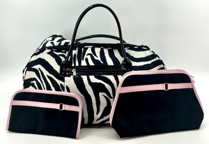 lot 84 image: Zebra Print Duffel Bag with 2 Black and Pink Accessory Pouches
