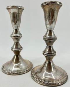 lot 92 image: Pair of Ornate Sterling Silver Duchin Creations weighted Candle Holders