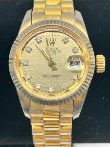lot 157 image: Faux Rolex Oyster Perpetual Gold and Stainless Steel ladies watch