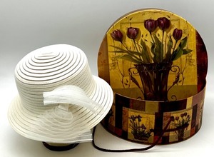 lot 175 image: Marshall Fields White Wide Brim Hat with Decorative Netting and Floral Hat Box
