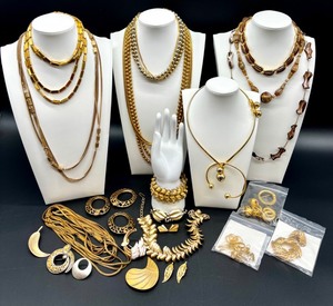 lot 240 image: Vintage Monet and Trifari Gold-tone Costume Jewelry Collection with Necklaces, Bracelets, and Earrings