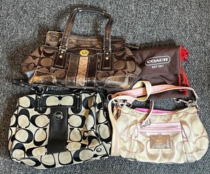 lot 148 image: Coach Signature Handbag Collection, Set of 3 with Dust Bag