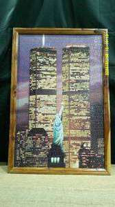 lot 18 image: Twin Towers & Statue of Liberty Framed Puzzle