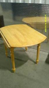 lot 33 image: Blonde Round Leafed Table
