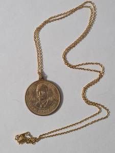 lot 45 image: Theodore Roosevelt Coin Copper Pendant
