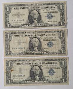 lot 75 image: 1957    1 Dollar Silver Certificate Blue Note,  1957-A    1 Dollar Silver Certificate Blue Note,  1957 - B   1 Dollar Silver Certificate Blue Note