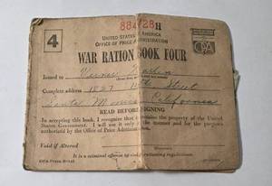 lot 29 image: War Ration Book #4 with stamps and War Ration Book #3 with stamps