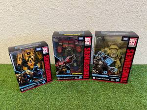 lot 37 image: Transformers Generations Bonecrusher, Optimus Prime & Constructicon Scrapmetal