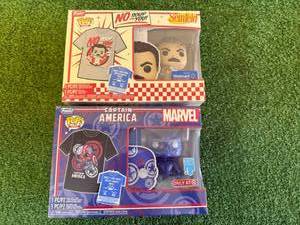 lot 56 image: Funko POP Seinfield No Soup For You & Captain America Both with T Shirts
