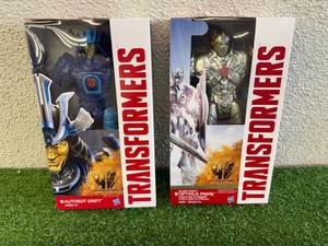 lot 75 image: Transformers Autobot Drift & Optimus Prime Silver Knight