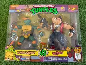 lot 98 image: TMNT Michaelangelo vs Bebop