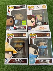 lot 146 image: Funko POP America Chavez, Raiden, Sub-Zero & D.Va