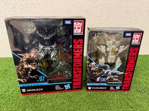 lot 174 image: Transformers Studio Series Grimlock & Starscream