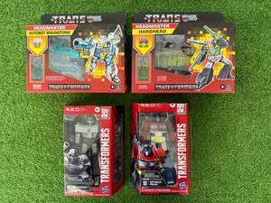 lot 221 image: Transformers Headmaster & R.E.D.