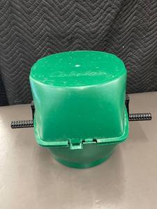 lot 24 image: Cabelas Green Plastic brass tumbler