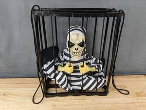 lot 166 image: Animated Halloween Skeleton Prisoner Decor, 12 - New