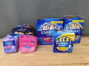 lot 317 image: 16 Always Thin Pads, 20 Always Liners, 20 Carefree liners, and 52 Tampax Pearl Tampons - Brand New
