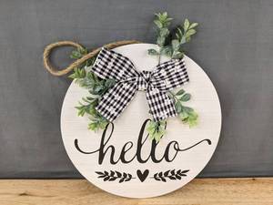 lot 343 image: 10.5 in Round Wood Hello Hanging Sign with Bow - Brand New