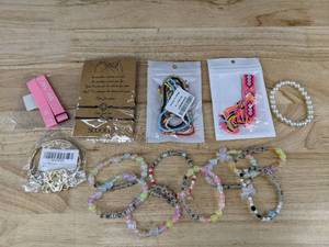 lot 502 image: 8 Taylor Swift Themed Bracelets and more - Brand New