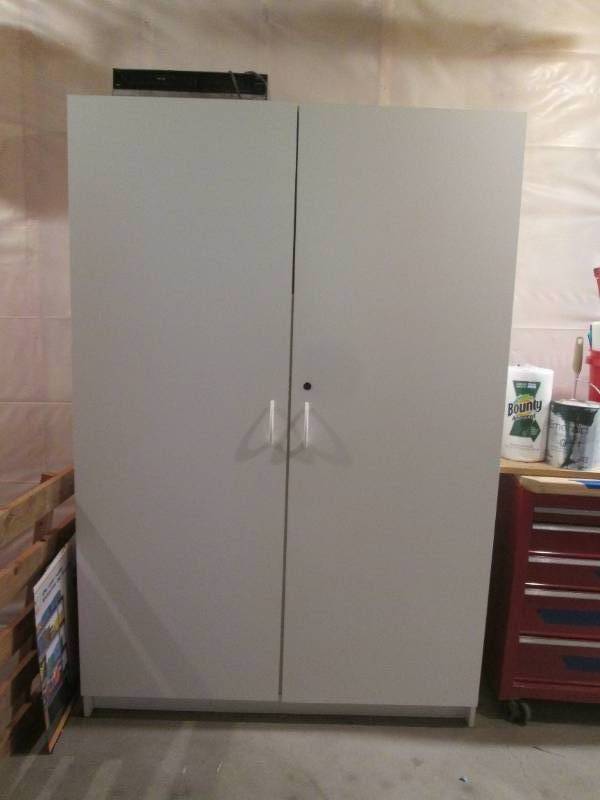 lot 47 image: Large Two-Door Cabinet  48 W x 21 D x 72 H