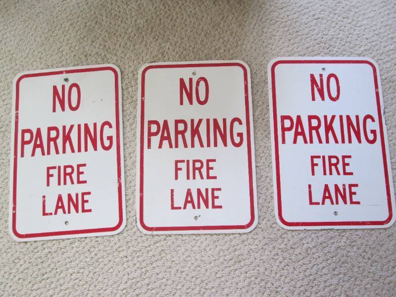 lot 119 image: Metal No Parking  Fire Lane Sign (12x18) - Lot of 3