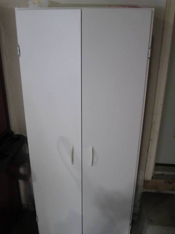 lot 270 image: White 2-door pantry style cabinet a...