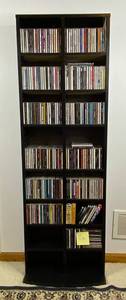 lot 137 image: Large Collection of Assorted Music CDs with Tall CD Shelf
