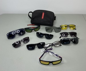 lot 404 image: Assorted Sunglasses with Prada Case