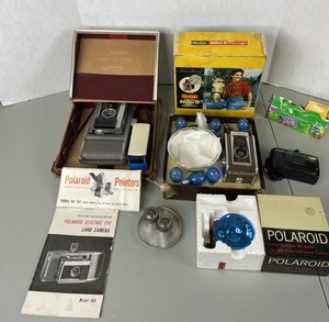 lot 25 image: Vintage Camera Lot - Polaroid J66, Kodak Duaflex IV, Canon Snappy TX & Accessories