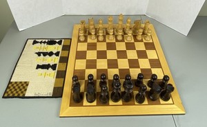lot 27 image: Large Wooden Chess Board with Chess Pieces and Needlepoint Art 21.5 x 21.5