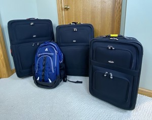 lot 28 image: 3-Piece Black Softside Luggage Set with Adidas Backpack