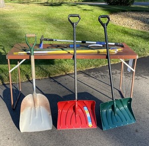 lot 227 image: Lot of Snow Shovels, Car Snow Brushes, and Driveway Marking Stakes