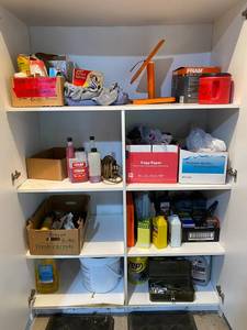 lot 301 image: Garage Cabinet Lot Oils, Cleaners, Funnels, Bags & Misc Tools
