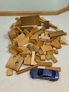 lot 391 image: Kids Wood Toy Blocks and Die-cast Maserati Model Car