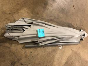 lot 36 image: CorLiving 9 ft. Steel Market Square Tilting Patio Umbrella in Sand Grey     Customer Returns See Pictures