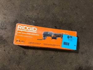 lot 65 image: RIDGID 4 Amp Corded Oscillating Multi-Tool customer return see pictures