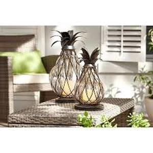 lot 57 image: Lot of Hampton Bay 12.5 in. Aged Bronze Outdoor Patio LED Candle Pineapple Lantern customer Return see pictures