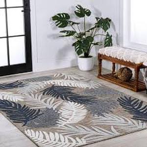 lot 26 image: JONATHAN Y Montego BrownNavyIvory 8 ft. x 10 ft. High-Low Tropical Palm IndoorOutdoor Area Rug  Customer Returns See Pictures