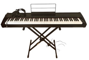 lot 14 image: Kawai ES4B Digital Piano with Hercules Stand, Quick Lock Stool, Headphones, and Pedal