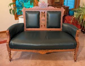 Beautiful Antique Eastlake Carved Walnut and Green Leather Settee