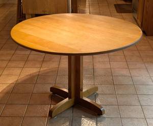 lot 10 image: Round Blonde Wood Dining Table