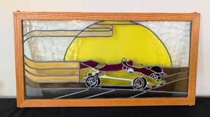 lot 42 image: Vintage Yellow and Red Stained Glass Race Car Panel