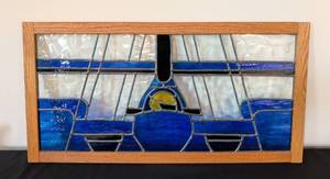 lot 29 image: Vintage Blue and Yellow Stained Glass Race Car Panel