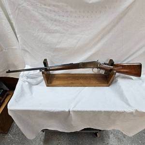 lot 8 image: Winchester Octagon Barrel Lever Action 94 in 25-35 WCF with Peep Sight